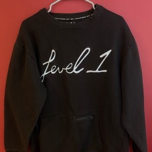 Level 1 skiing crew neck sweatshirt.